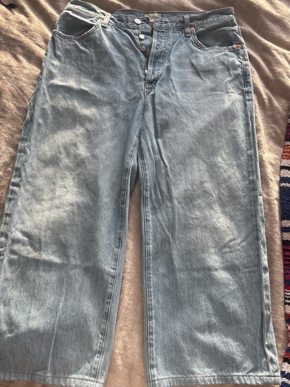 Citizens Of Humanity faded light blue distressed denim jeans